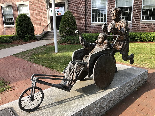 Bronze statue of Dick and Rick Hoyt near the start of the Boston Marathon in Hopkinton, Massachusetts.