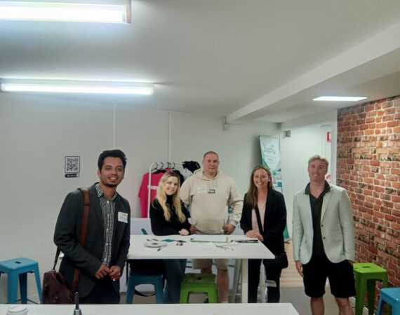 Naren, Chloe, Wendy, and Myself smiling together at the networking event.